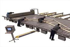 A wide range of equipment is available to automate the truss manufacturing process.This project presented several challenges including greater scalability, additional features, and reduced cost